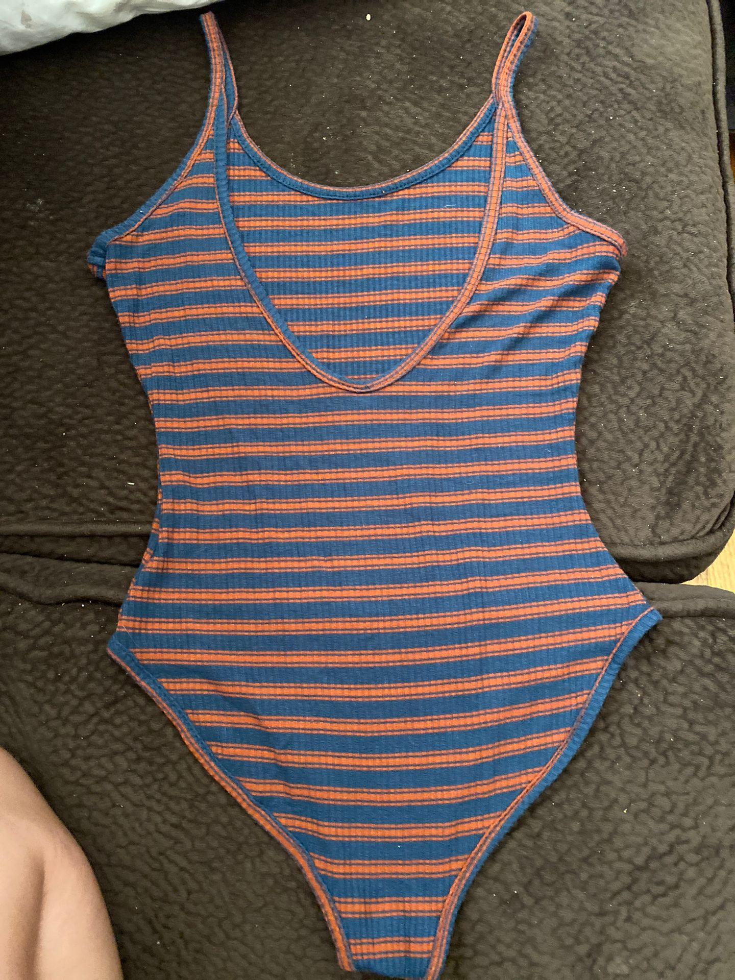 bodysuit, orange and blue stripes,