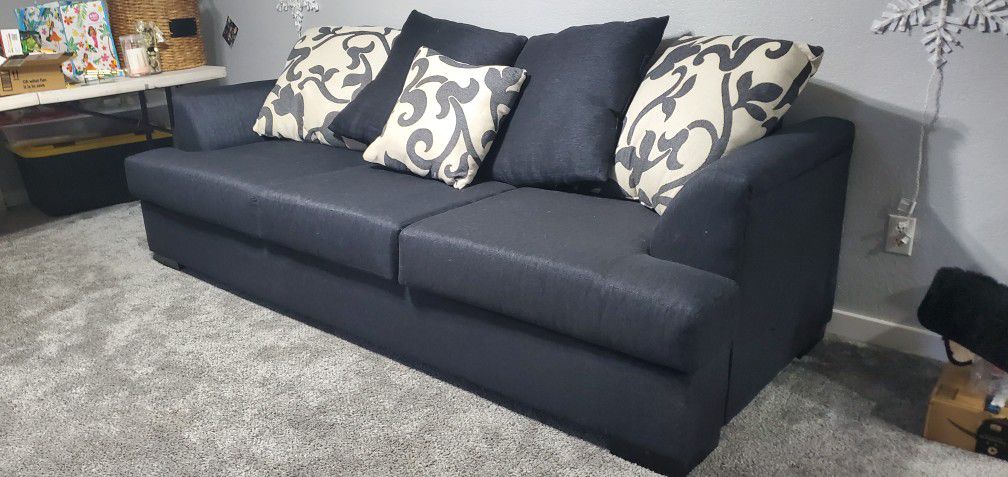 Dark Tweed Couch With Pillows