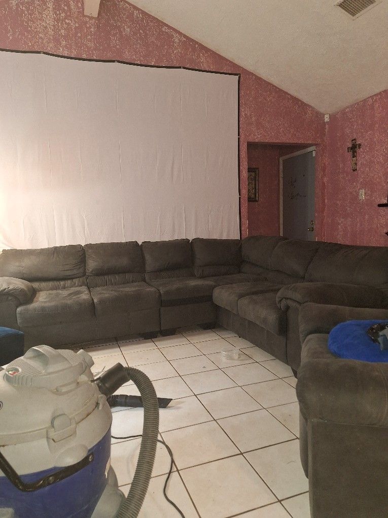 Dark grey sectional and Recliner 500.00 Will Sell Incliner Seperate for 200.00 If U Just Want The InclinerOr Make an offer