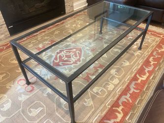 Rectangular two level Glass / Iron Tanner Heavy stately Glass Coffee Table from Pottery Barn.