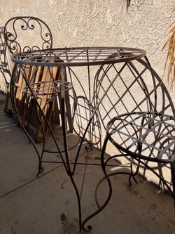 Wrought iron bar style table