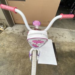 Disney  bike with training wheels and toy bag - 16" wheels