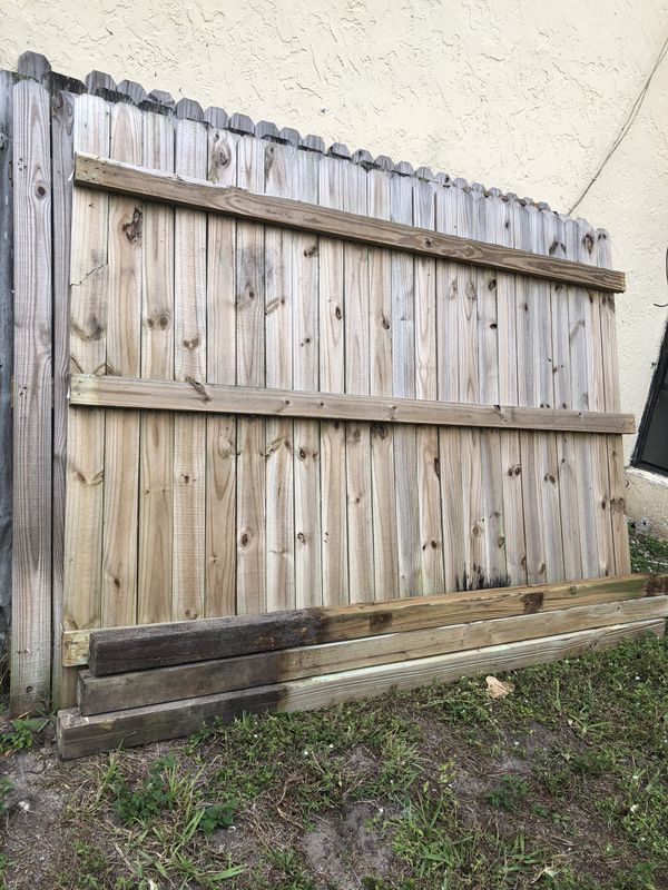 Used wood fence 6 big pieces fences and 6 poles for sale for Sale in