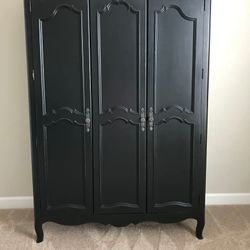 Young America Stanley Ma Marie Black Wooden Armoire