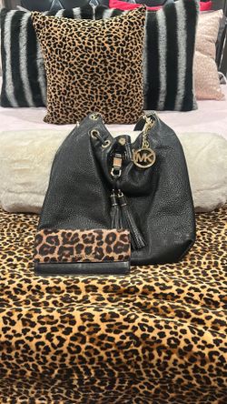 Used Michael Kors black purse and leopard wallet! Plus sunnies!