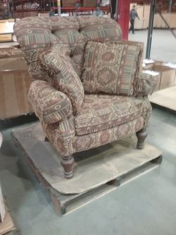 High end fringed arm chair pillows and ottoman.... .. native American feel