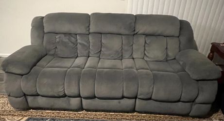 Reclining and rocking living room couch and loveseat set