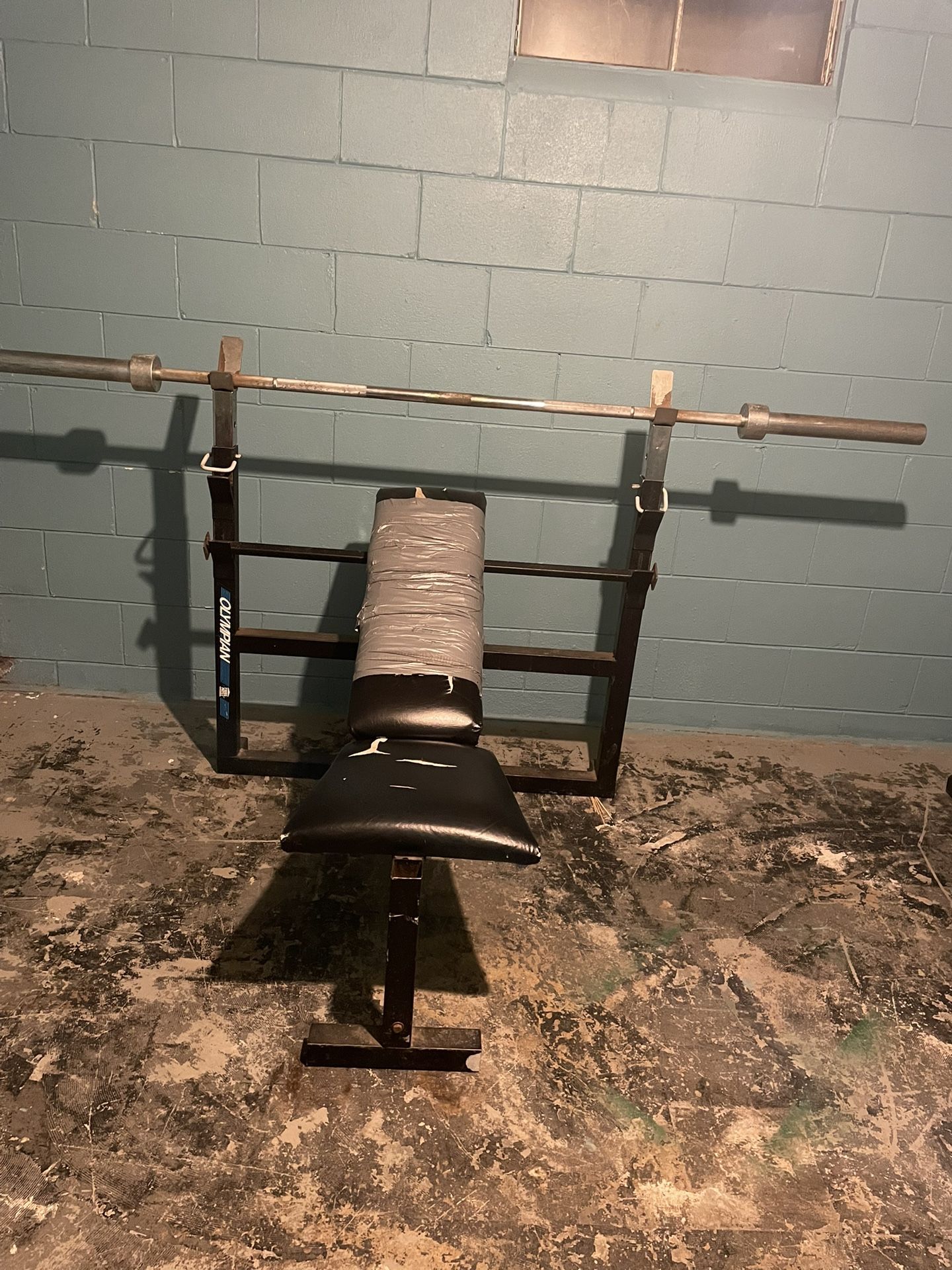 Olympian Bench and weight bar