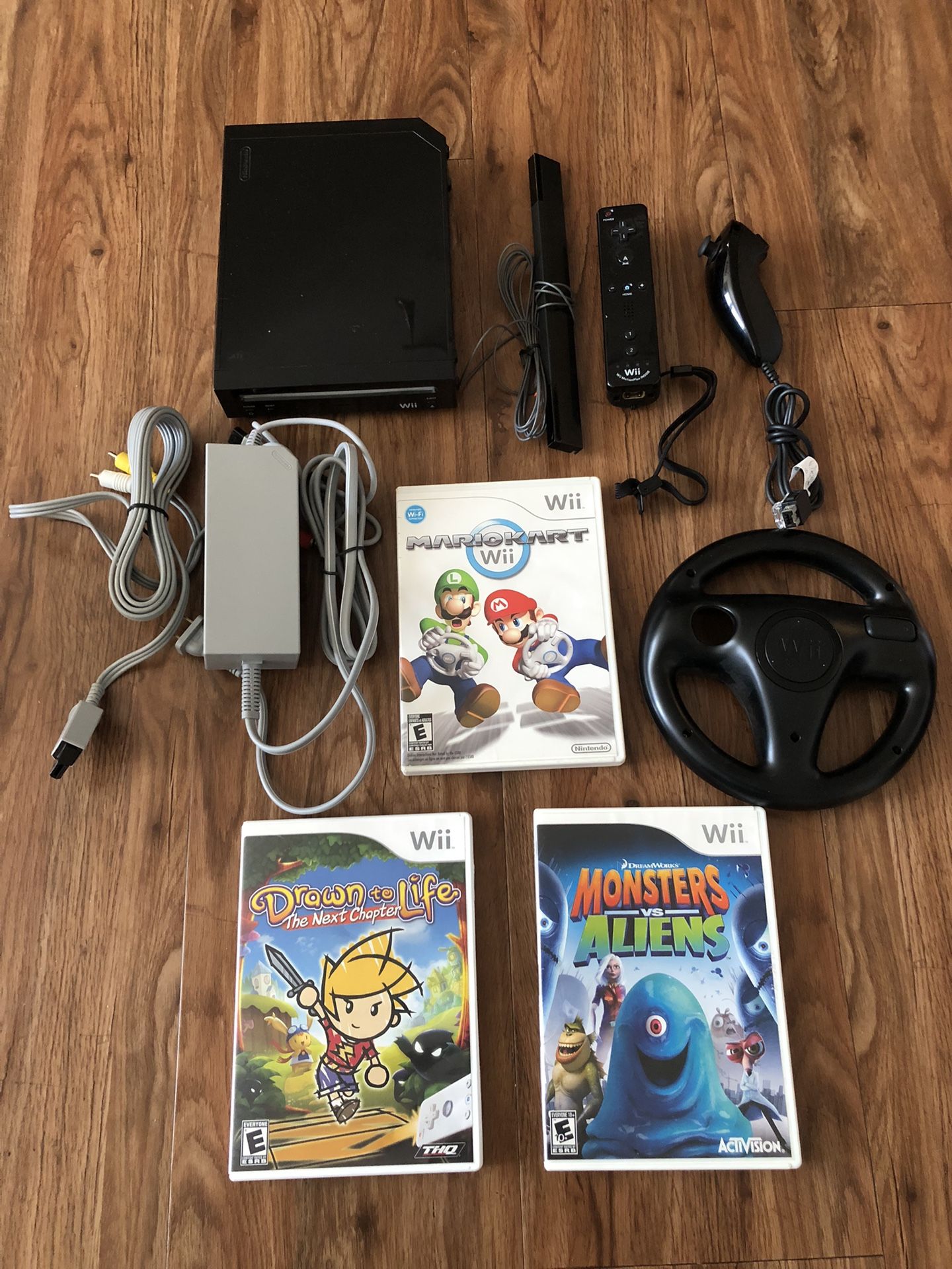 Nintendo Black Wii System with Controller, Nunchuck, Mario Kart Game with Steering Wheel