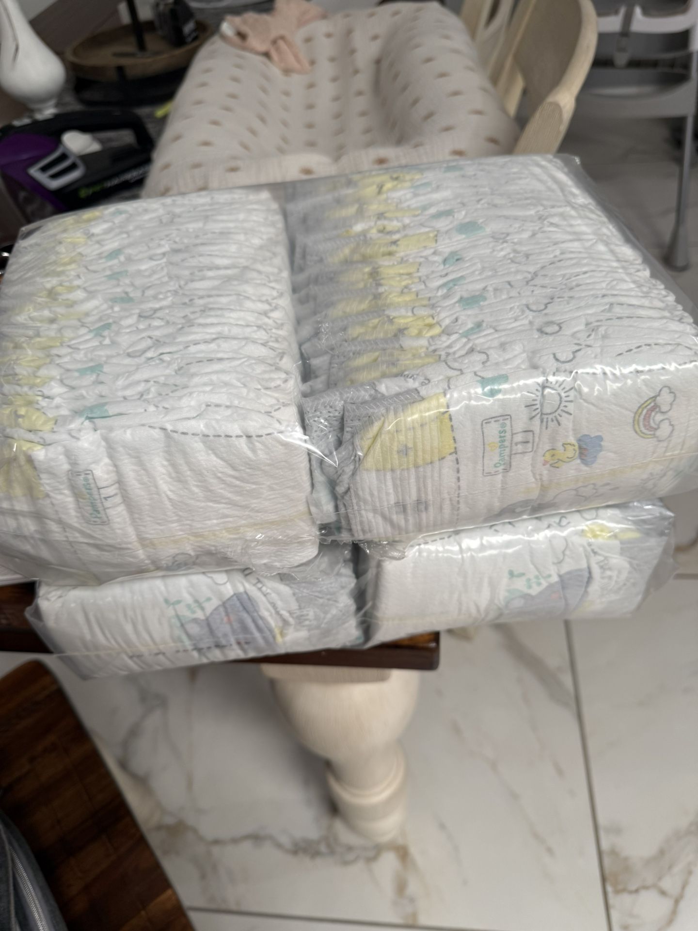 Two Sleeves Of Size 1 Pampers