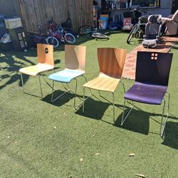 4 MODERN LOOKING CHAIRS