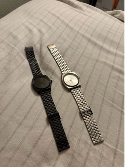 Nixon watches / Silver and Black