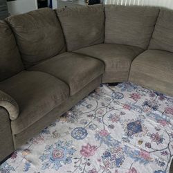 Large Brown Curved Couch