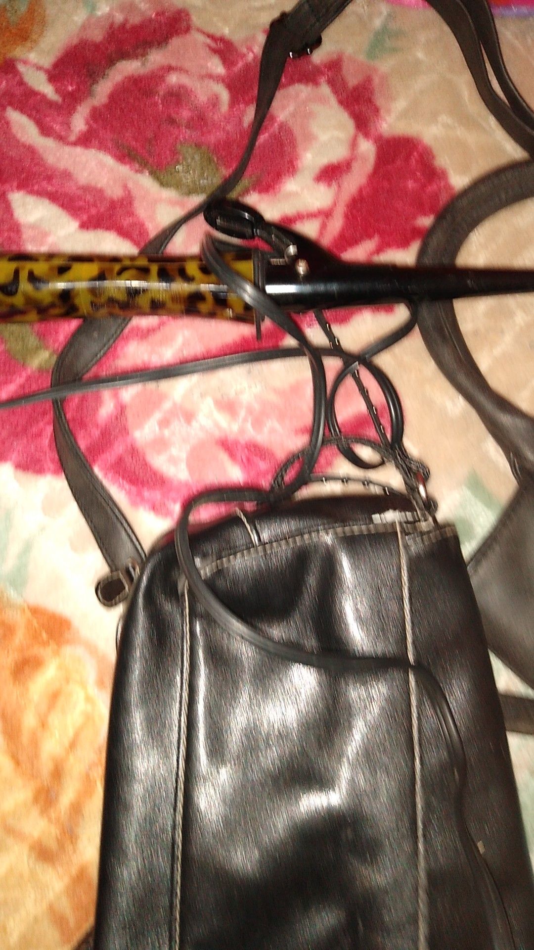 Women's clothes medium and large some has tags..purses and bags and curler