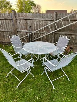 Wrought Iron Patio Set,, Table With 4 bouncy spring chairs