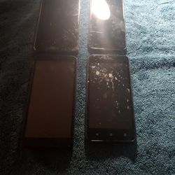 BAG OF 4 CELL PHONES. 