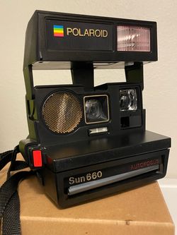 Polaroid Sun660 Autofocus Land Camera with strap