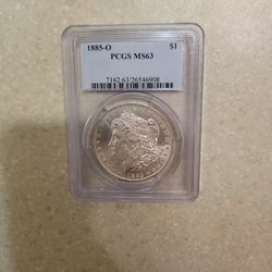 1885 O Morgan Silver Dollar.  Graded 