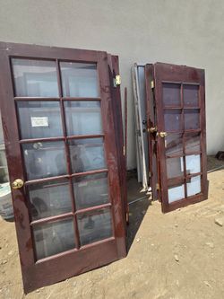 Pair of Wood French Doors with Glass Panes