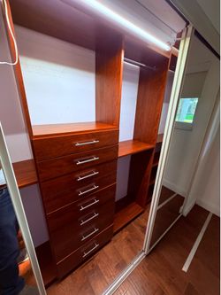 Closet system for 2 closets, laminated wood particle board, disassembled, pick up by Sunday 6/21, priced to go!