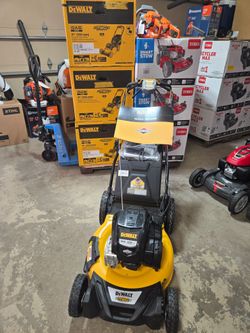 Brand new Dewalt Self-Propelled Lawnmower 
163cc Briggs &Stratton Engine 
Rear wheel Drive 
$399