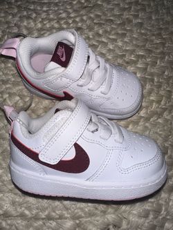 Baby Nikes size 5
