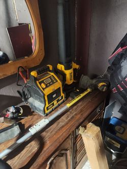 Yard tools, needs battery charger, and car jumper