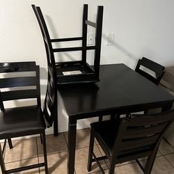All Black Wooden Tables and Chairs