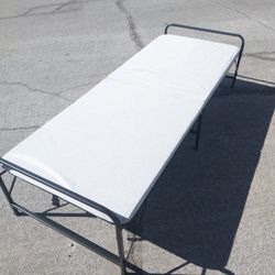 Brand new folding bed with mattress with package