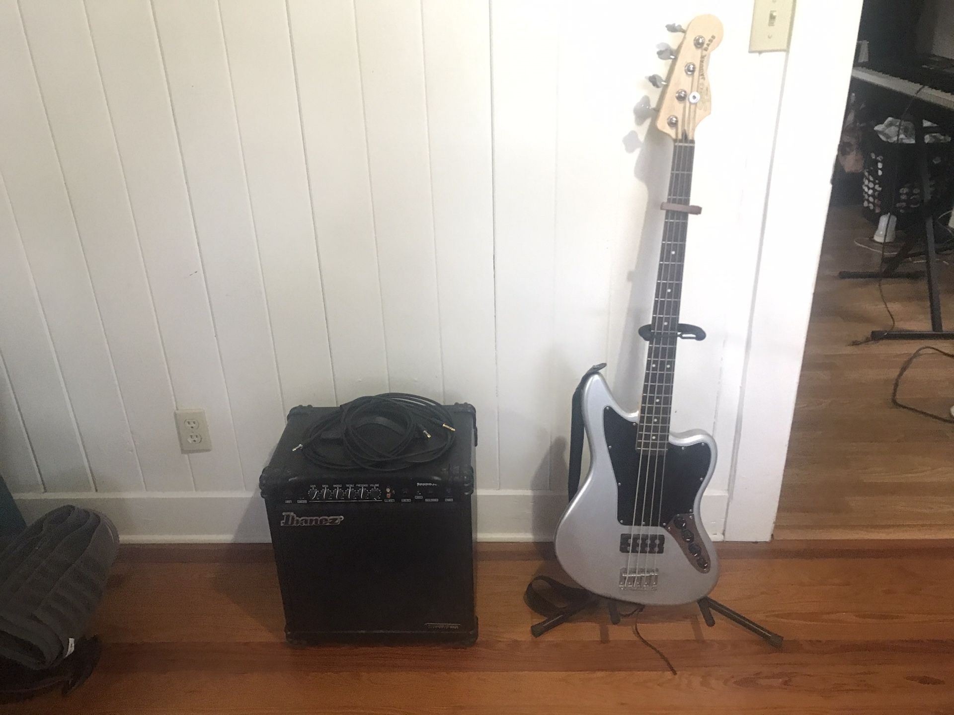 Jaguar Squier Bass Guitar Kit w Amp Stand Shoulder Strap and more