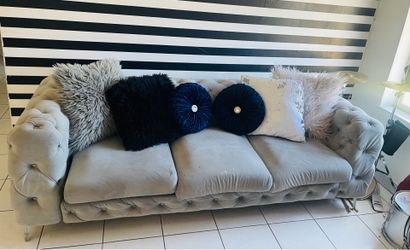 Grey button sofa
