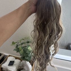 Curled Hair ponytail