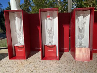 3 Baccarat crystal champagne flutes. Never been used and still in boxes!