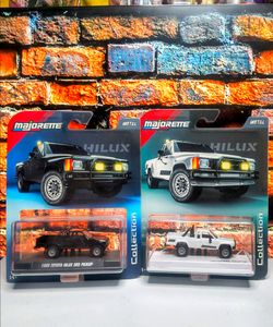 Majorette Collection 1985 Toyota Hilux SR5 Pickup Black & White Versions both $35