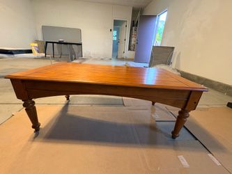 A Solid Wood Coffee Table— Klaussner