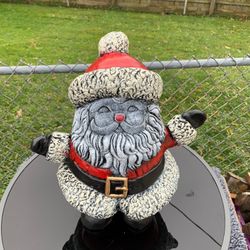 Mid Sanctuary Hands Out Santa Statues