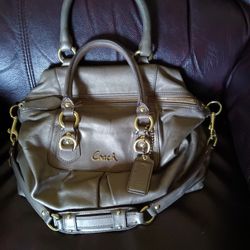 A Medium Sized Coach Satchel A Soft Bronze Color 
