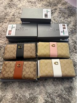 Coach wallets ($50 each one