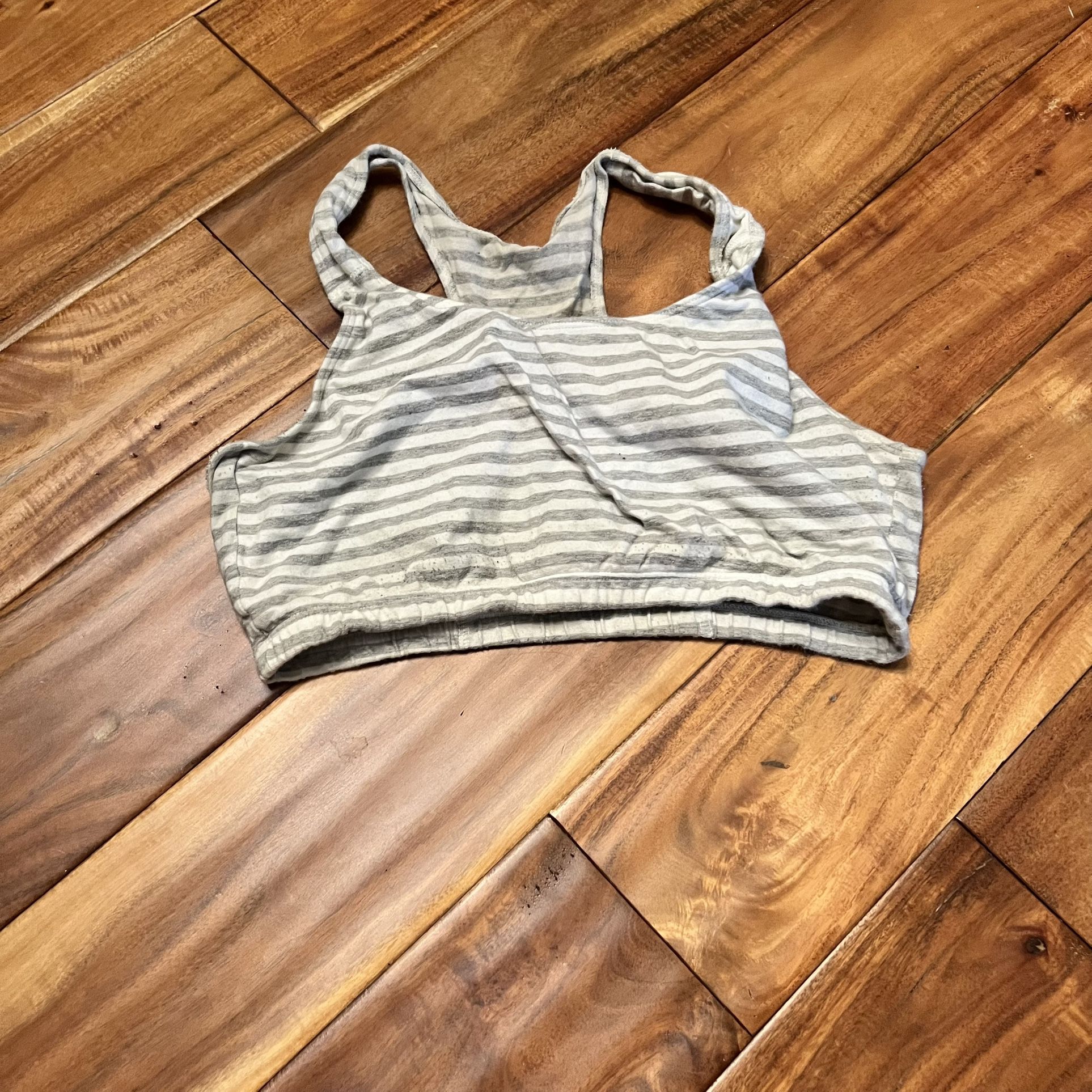 Women’s gray and white striped fruit of the loom sports bra. Size 38