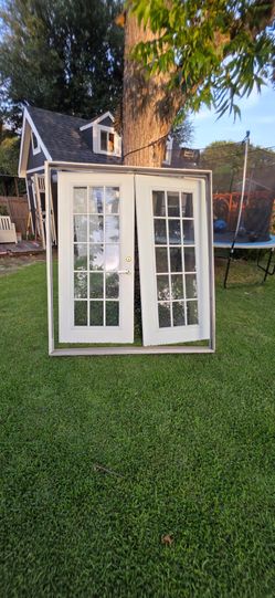 72x80 back double doors , framed ready to install.