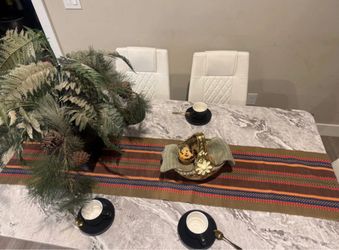 World Market woven cotton table runner featuring a Southwestern or Mexican-inspired serape stripe design.