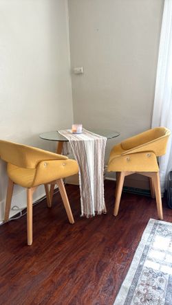 Glass Table w/ Yellow Chairs