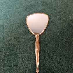 Vintage Victorian ornate metal hand mirror