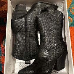 Woman’s Black Boots