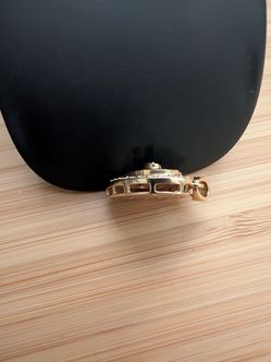 14K heart-shaped pendant with diamonds