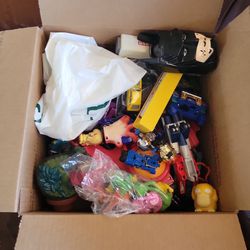 Box of random vintage toys. Hot Wheels, pokemon, gi joe ect.