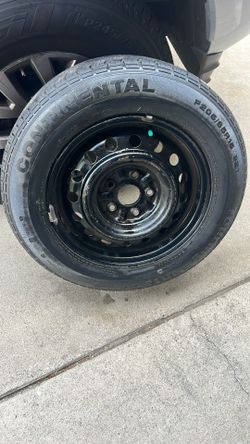 P205/65 R15 Continental Tire With Rim 75 Or More % tread