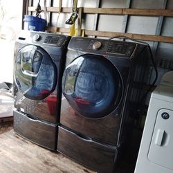 Washer dryer on pedestals electric dryer