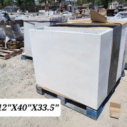 CONCRETE PLANTERS $450 EACH