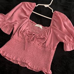 pink silk shirt